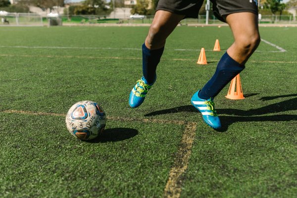 What are the emerging trends in football training programs for enhancing speed?