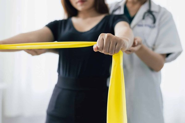 How can UK sports therapists effectively treat chronic injuries in professional athletes?